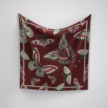 Whimsical wings in Deep wine